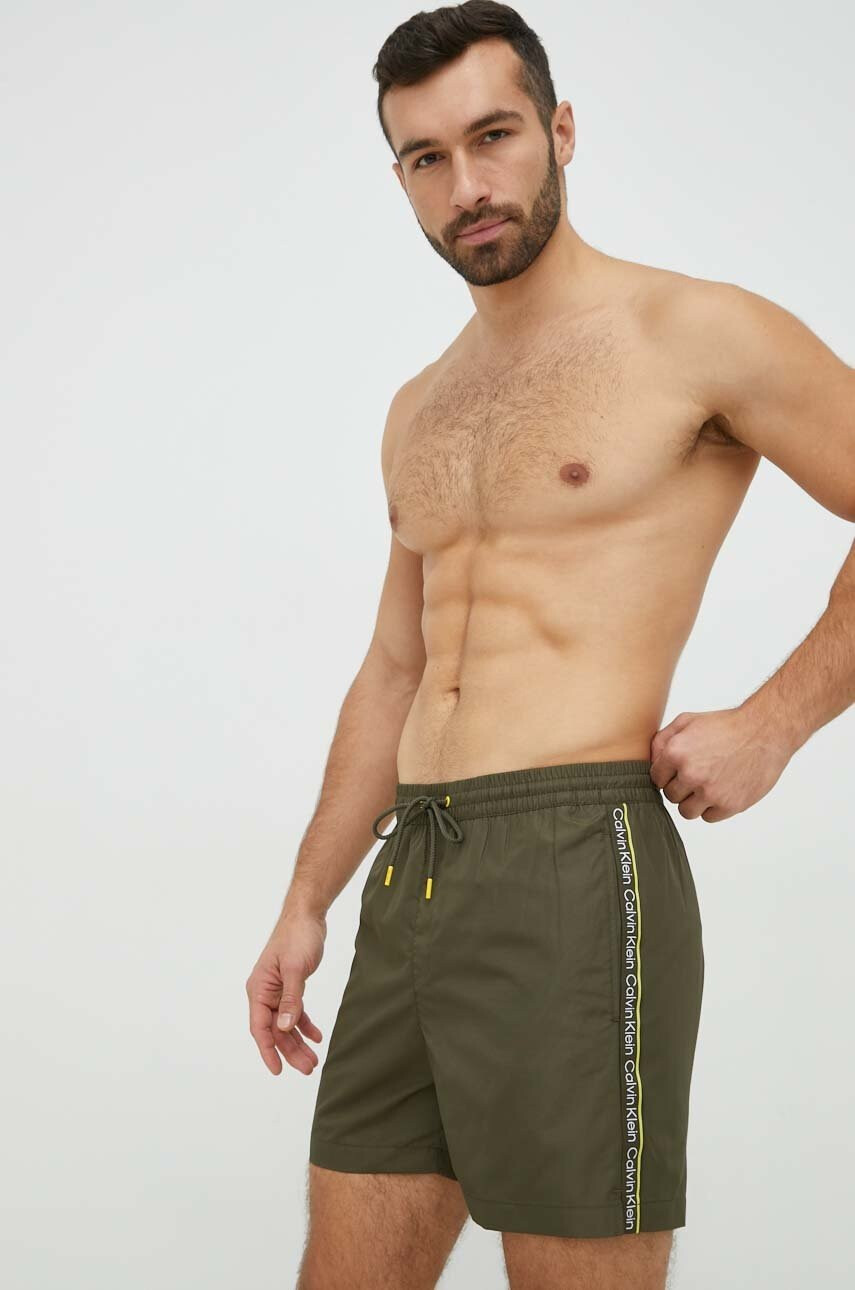 Calvin Klein Плувни шорти в зелено - Pepit.bg