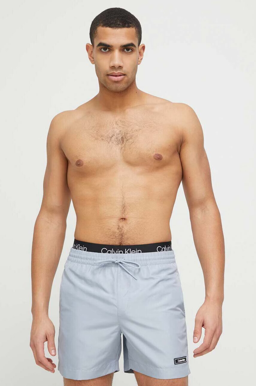 Calvin Klein Плувни шорти в сиво - Pepit.bg