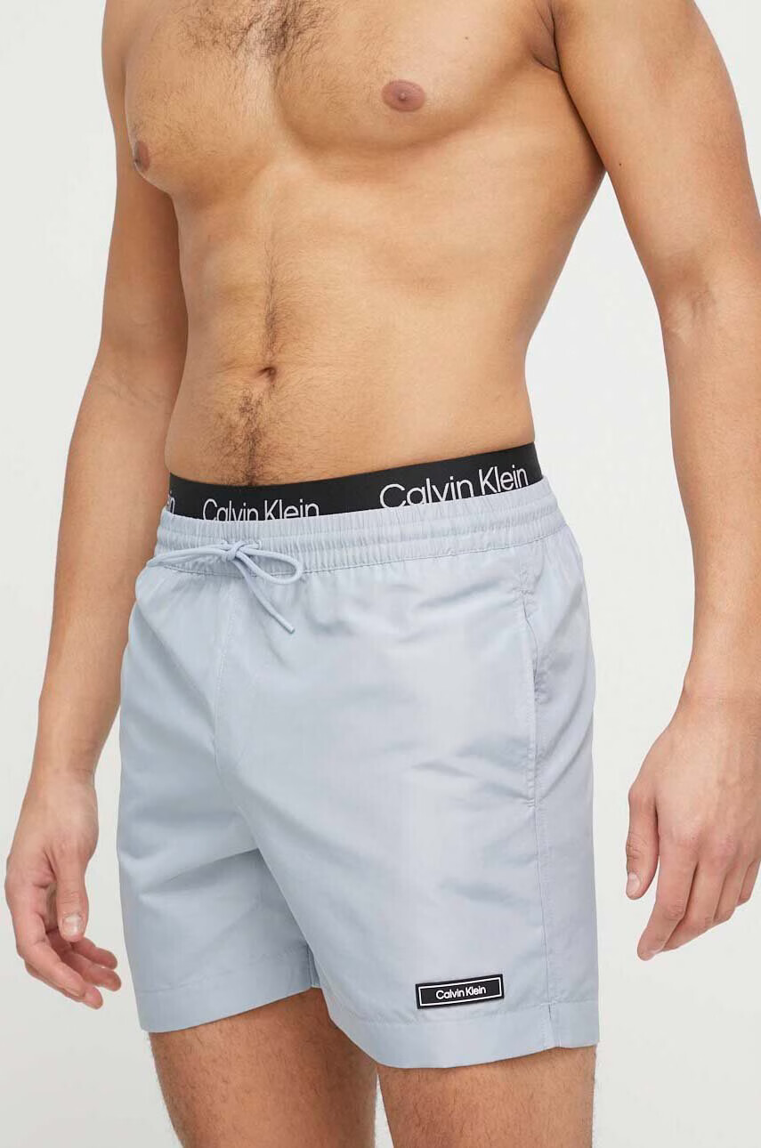Calvin Klein Плувни шорти в сиво - Pepit.bg