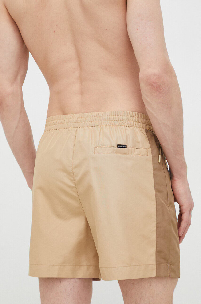 Calvin Klein Плувни шорти в бежово - Pepit.bg