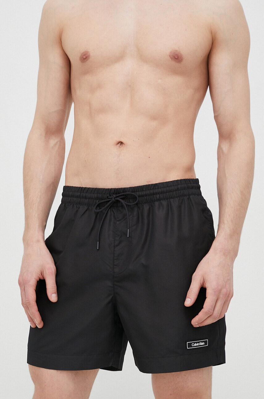 Calvin Klein Плувни шорти в черно - Pepit.bg