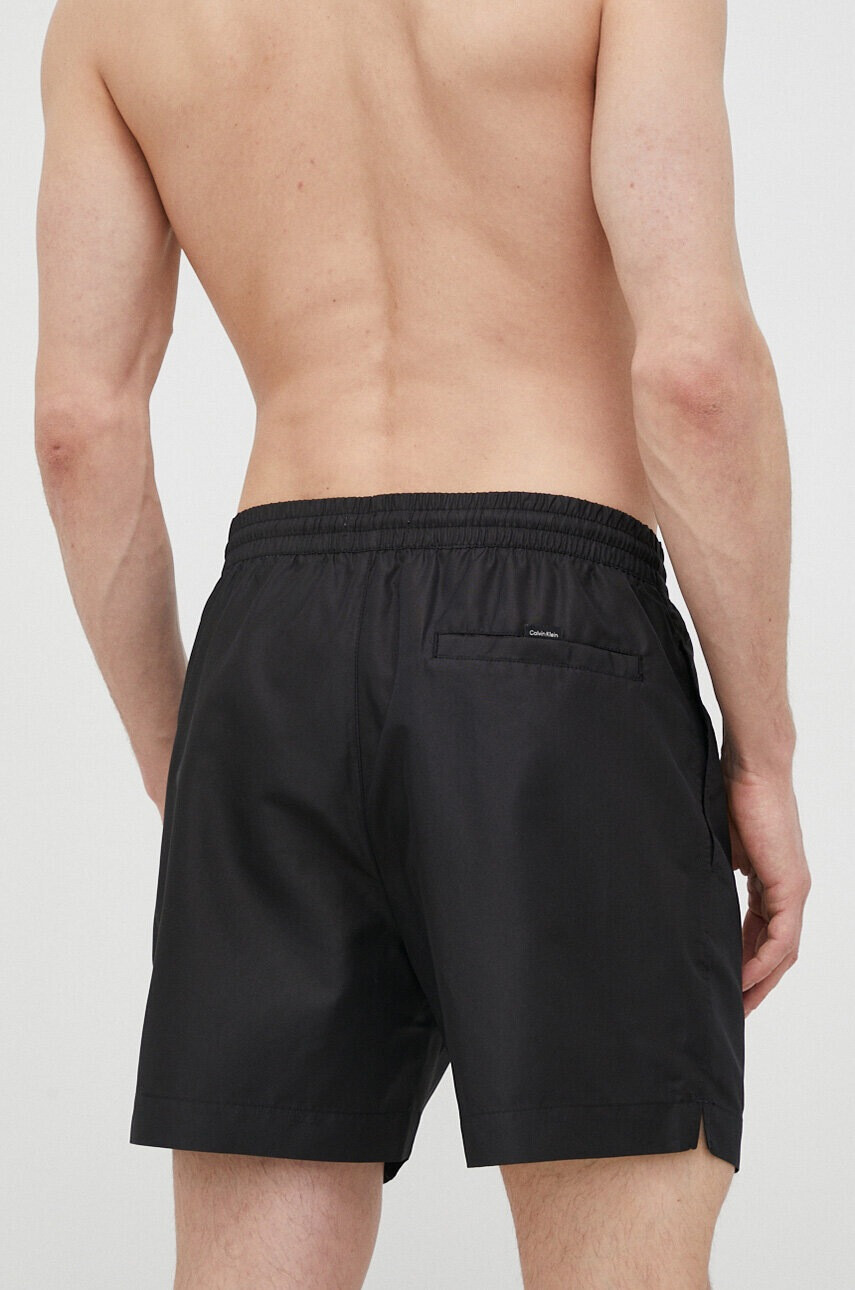 Calvin Klein Плувни шорти в черно - Pepit.bg