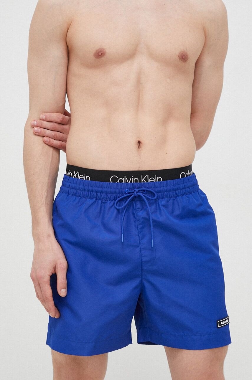 Calvin Klein Плувни шорти в синьо - Pepit.bg