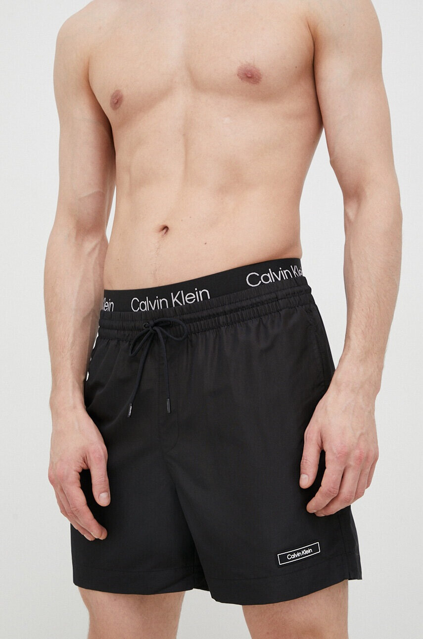 Calvin Klein Плувни шорти в черно - Pepit.bg