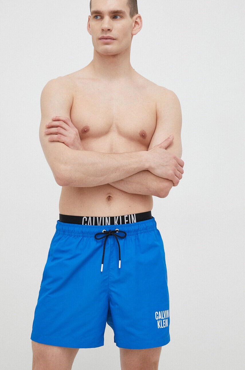 Calvin Klein Плувни шорти в синьо - Pepit.bg
