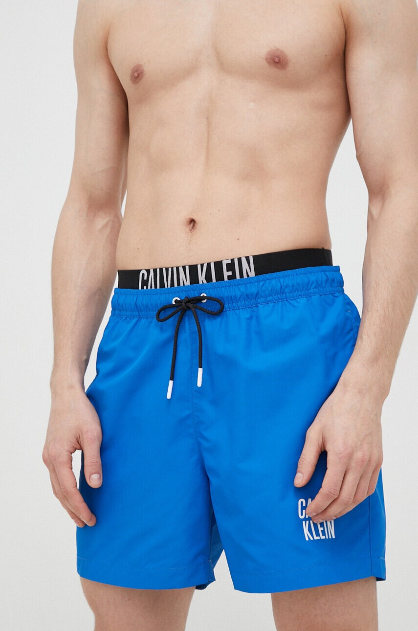 Calvin Klein Плувни шорти в синьо - Pepit.bg