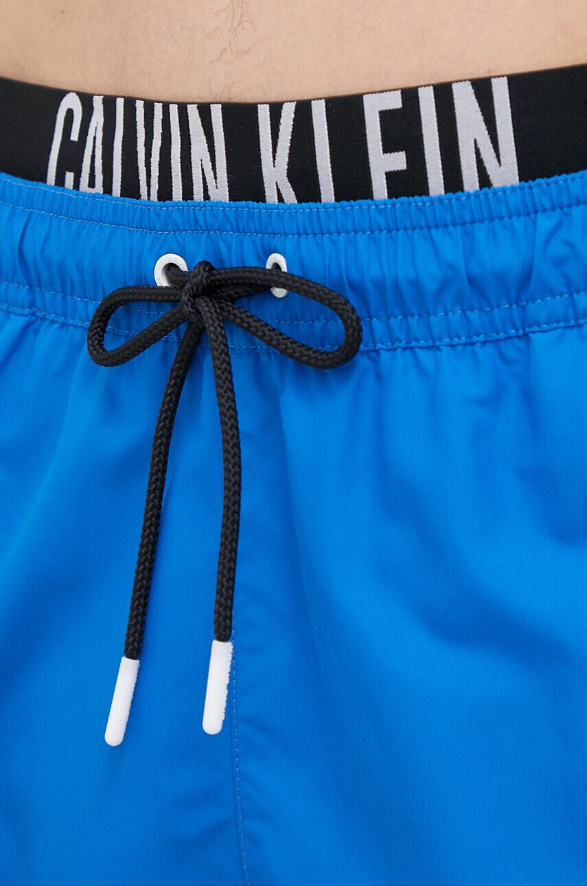 Calvin Klein Плувни шорти в синьо - Pepit.bg