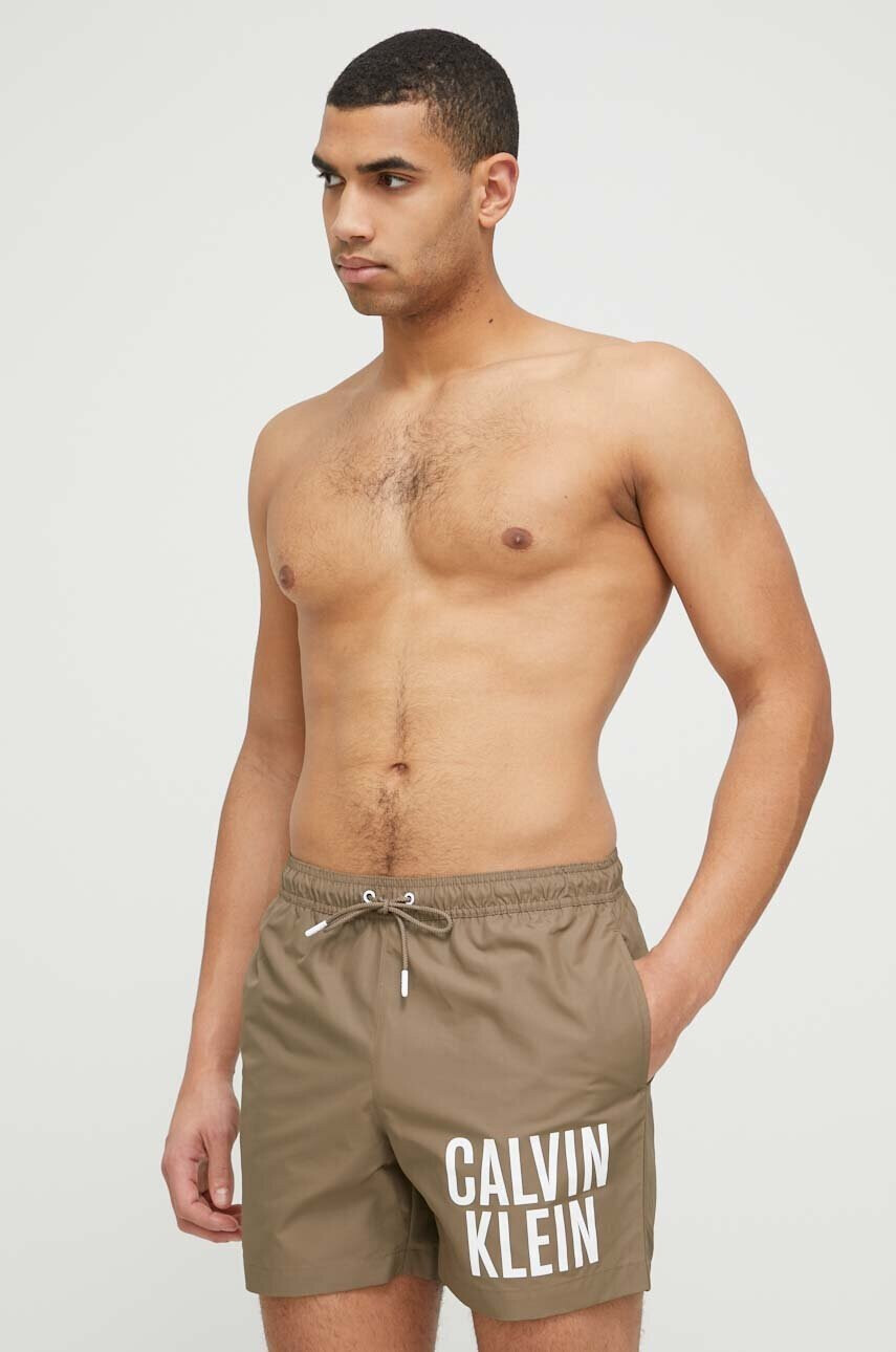 Calvin Klein Плувни шорти в кафяво - Pepit.bg