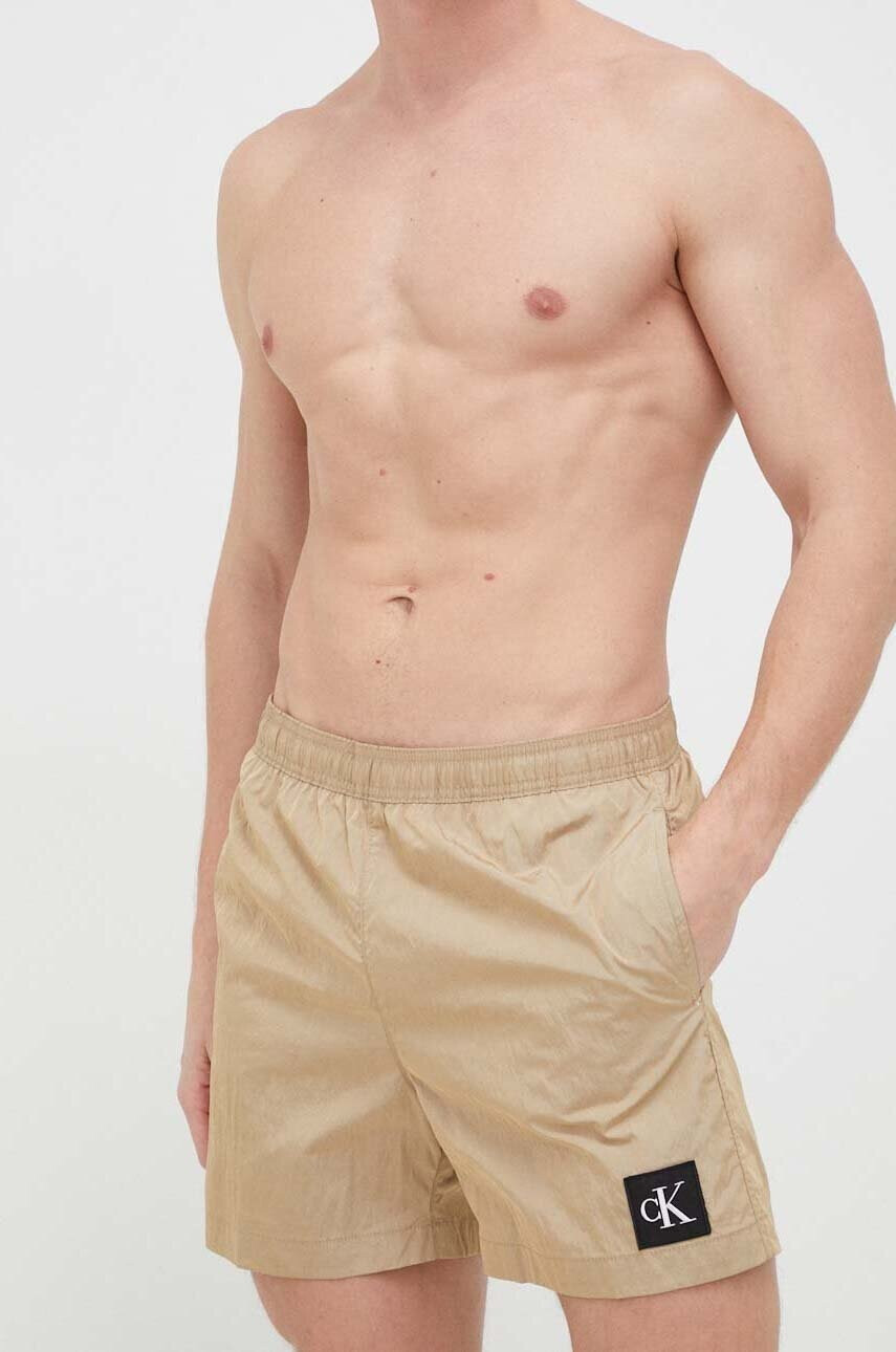 Calvin Klein Плувни шорти в бежово - Pepit.bg