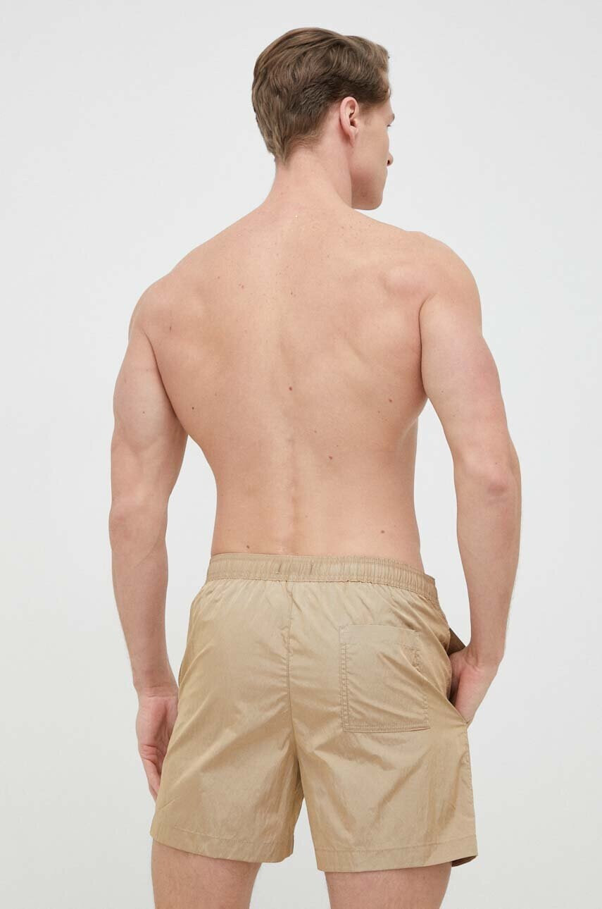 Calvin Klein Плувни шорти в бежово - Pepit.bg
