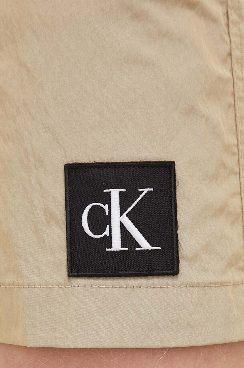 Calvin Klein Плувни шорти в бежово - Pepit.bg