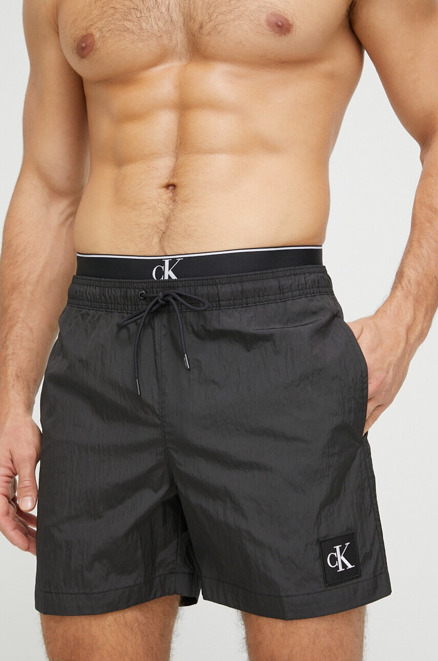 Calvin Klein Плувни шорти в черно - Pepit.bg