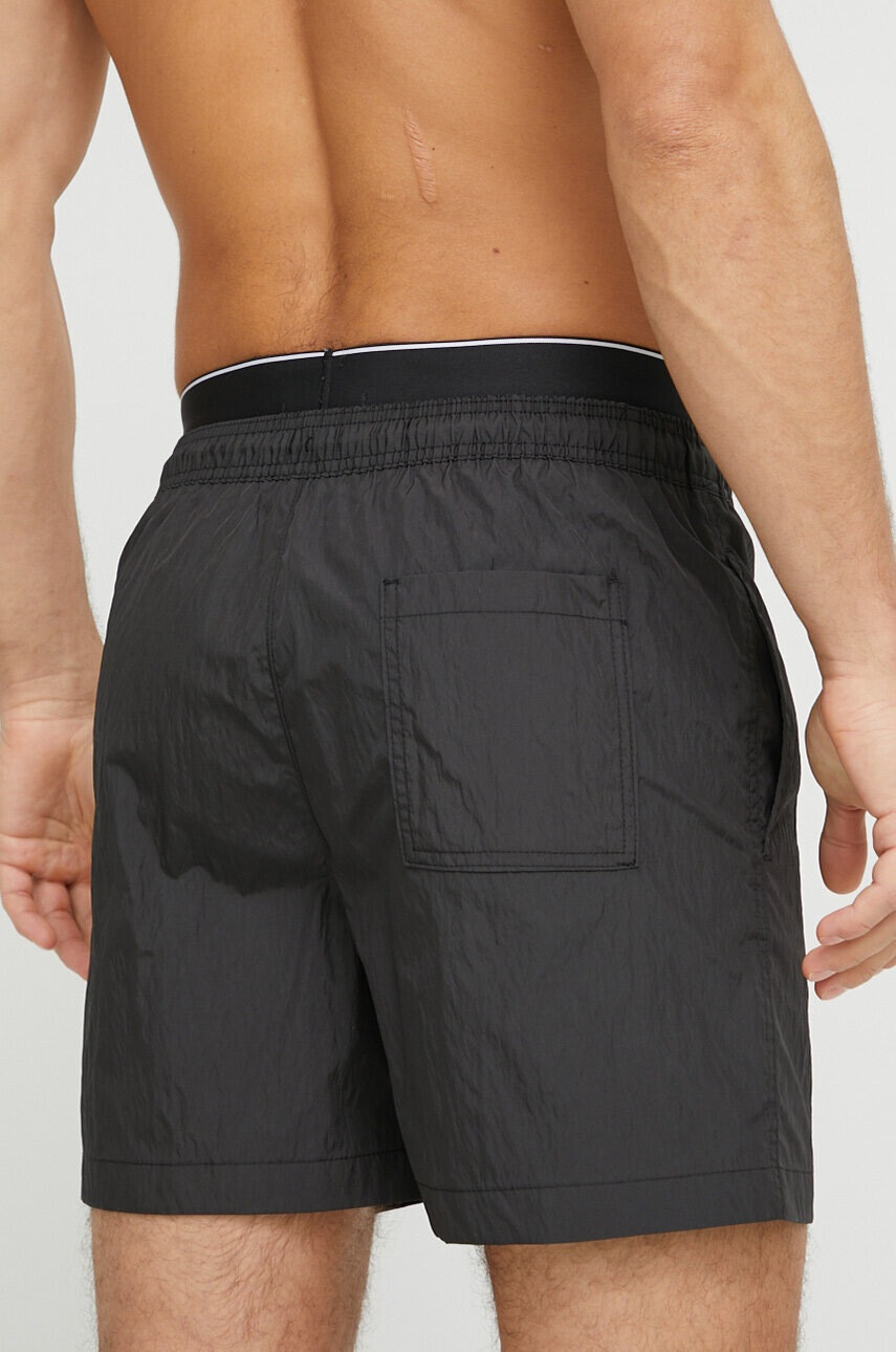 Calvin Klein Плувни шорти в черно - Pepit.bg