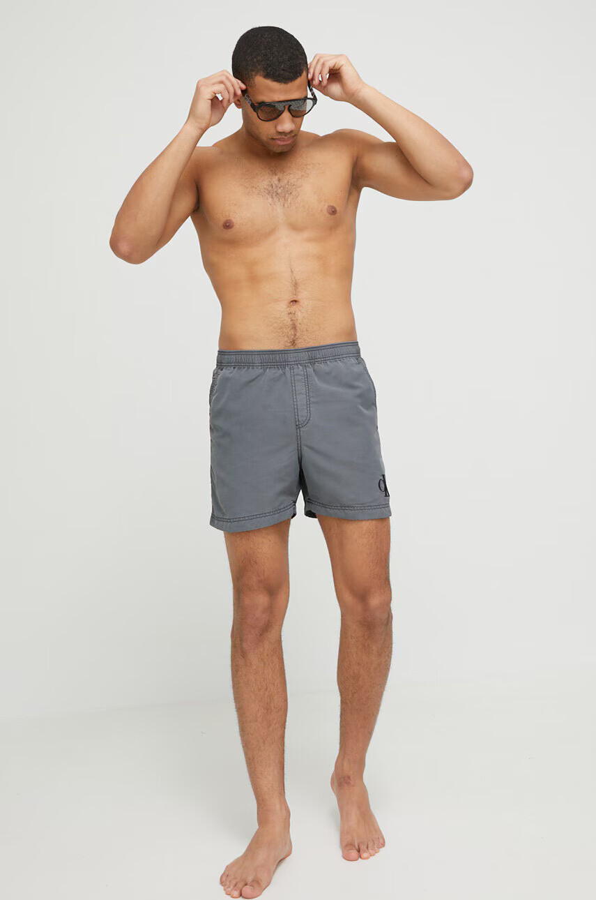 Calvin Klein Плувни шорти в сиво - Pepit.bg