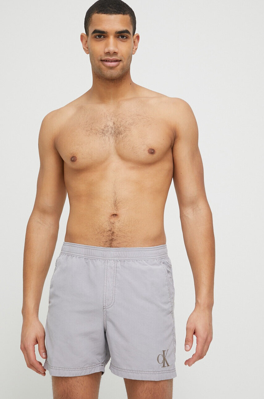 Calvin Klein Плувни шорти в сиво - Pepit.bg