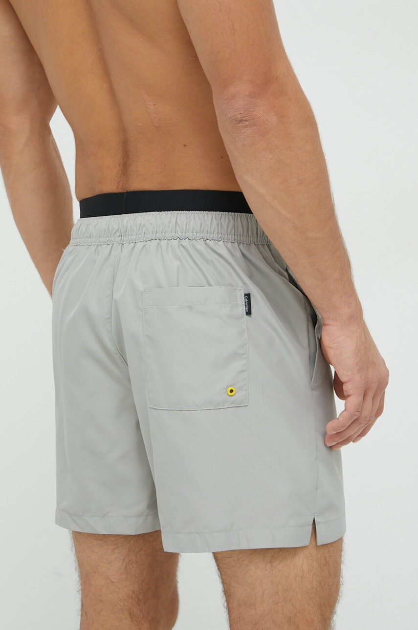 Calvin Klein Плувни шорти в сиво - Pepit.bg