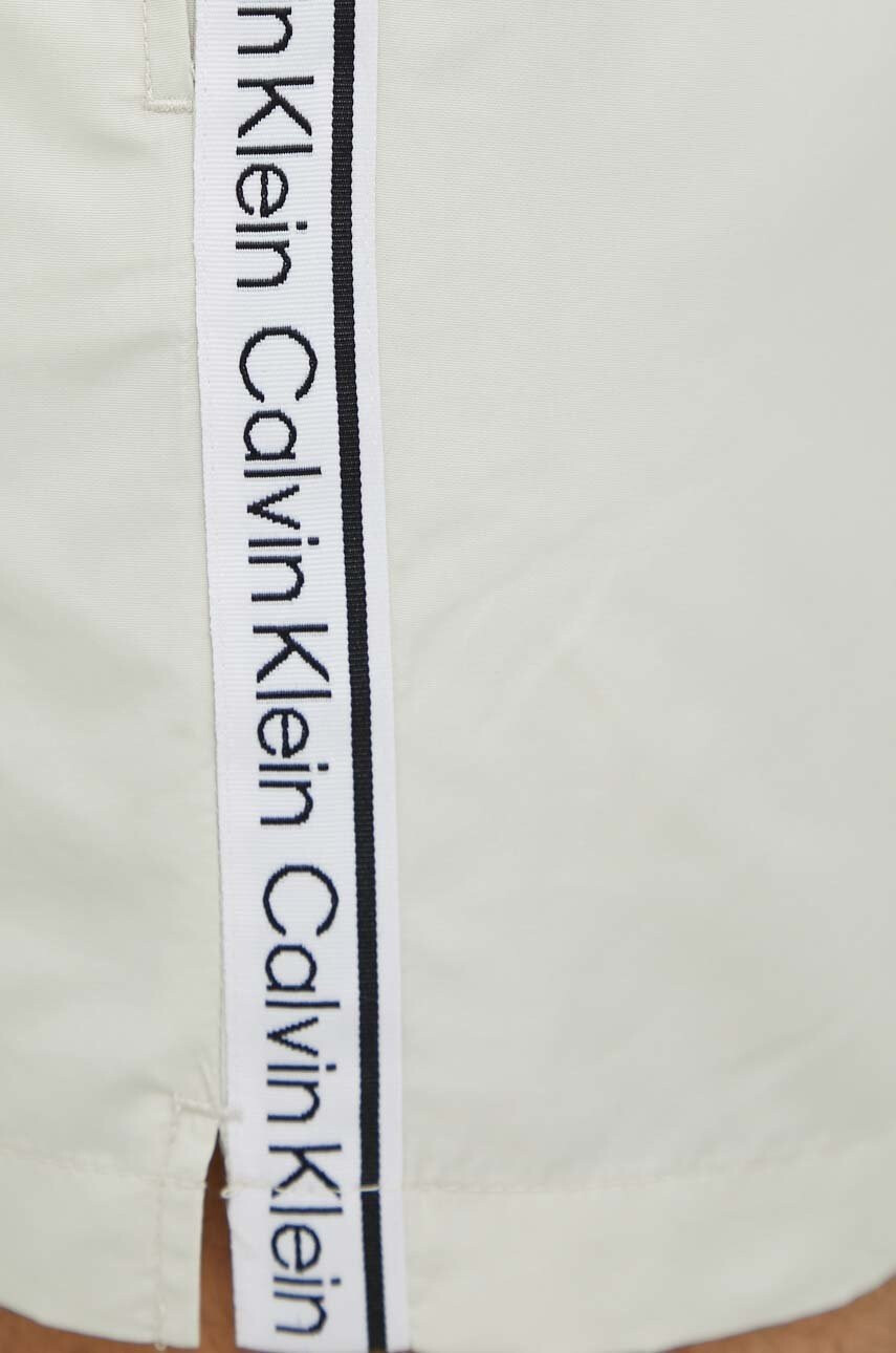 Calvin Klein Плувни шорти в бежово - Pepit.bg