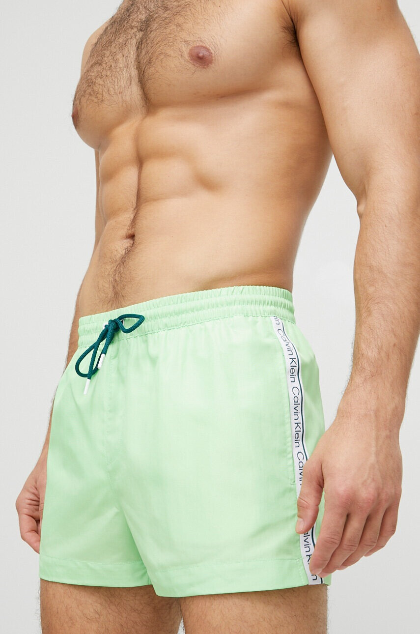 Calvin Klein Плувни шорти в зелено - Pepit.bg