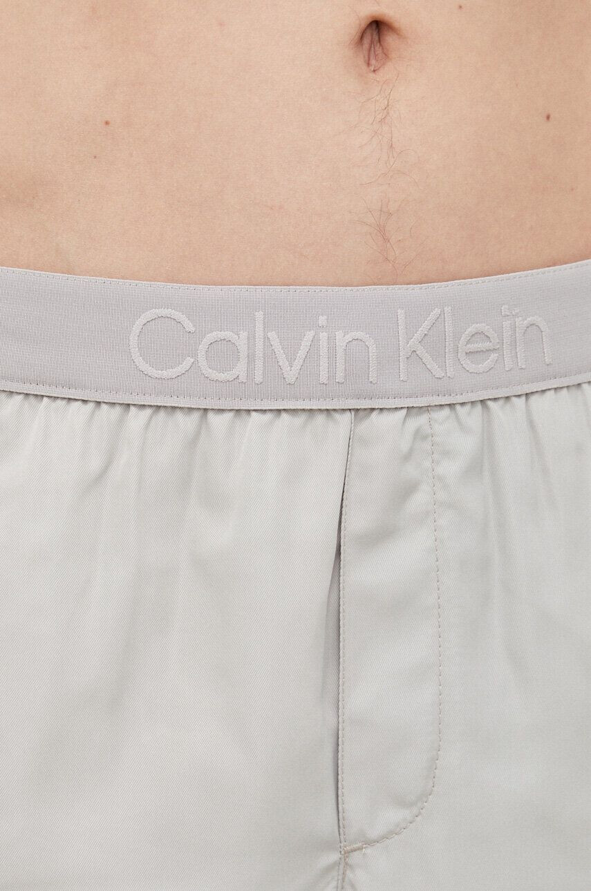 Calvin Klein Плувни шорти в сиво - Pepit.bg