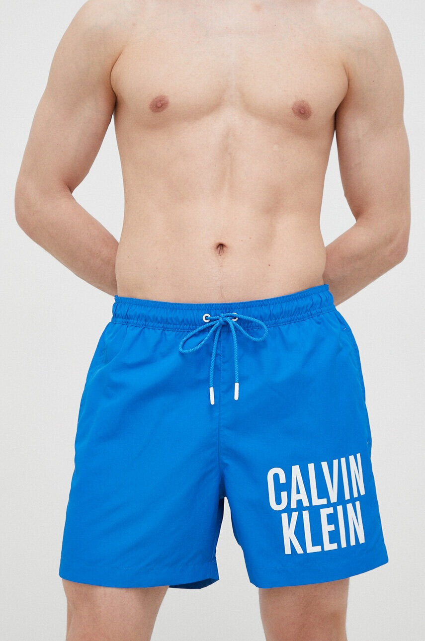 Calvin Klein Плувни шорти в синьо - Pepit.bg