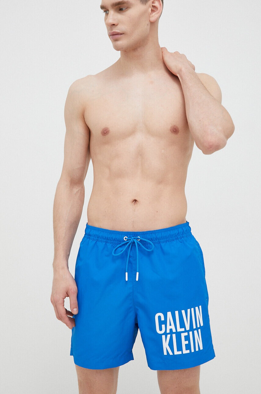 Calvin Klein Плувни шорти в синьо - Pepit.bg