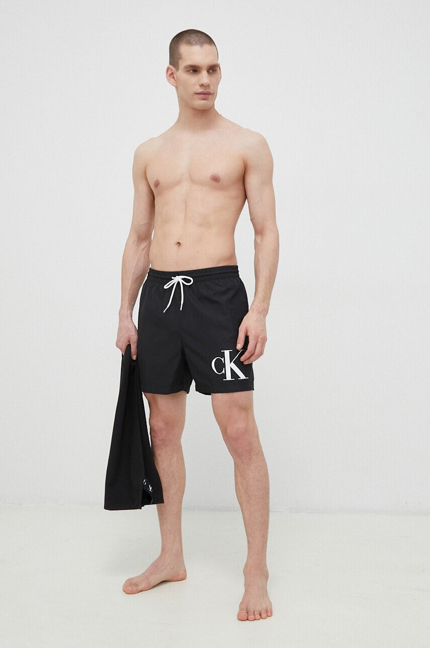 Calvin Klein Плувни шорти в черно - Pepit.bg