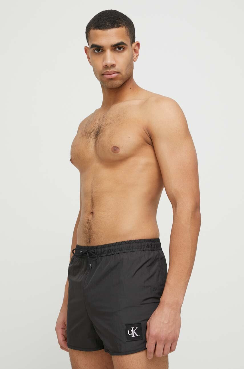 Calvin Klein Плувни шорти в черно - Pepit.bg