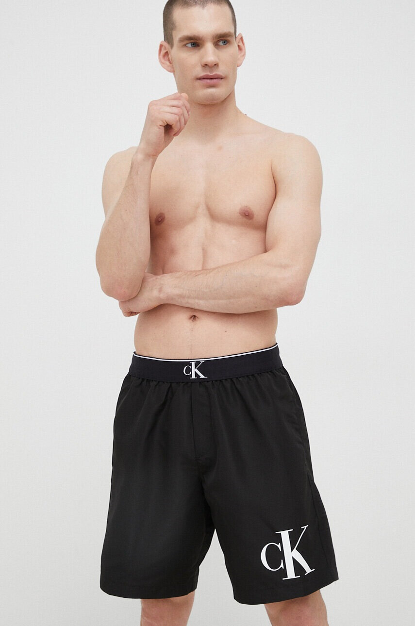 Calvin Klein Плувни шорти в черно - Pepit.bg