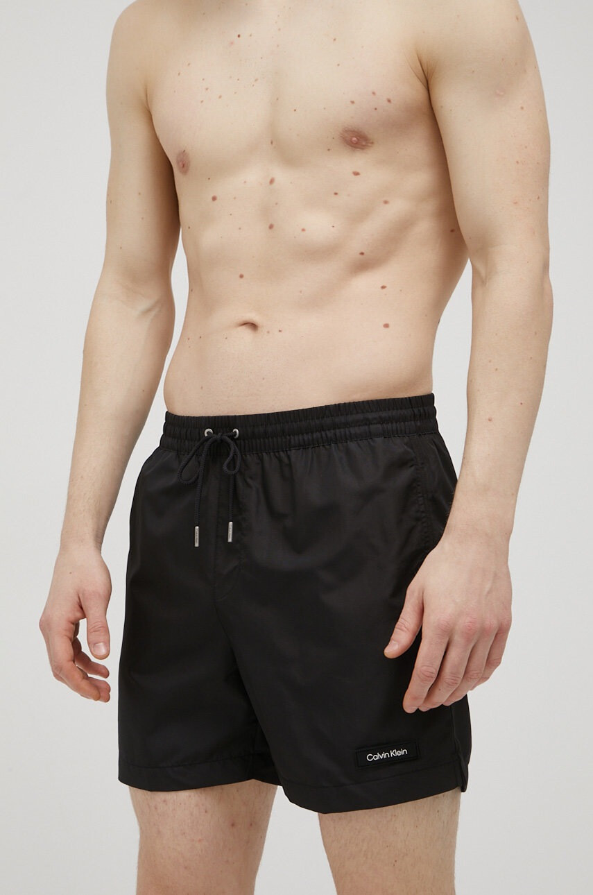Calvin Klein Плувни шорти в черно - Pepit.bg