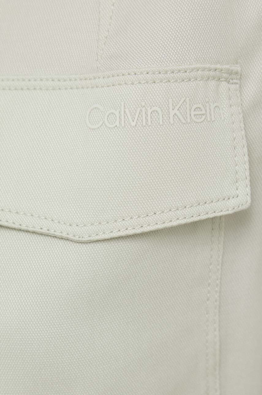 Calvin Klein Рокля с лен в бежово дълъг модел със стандартна кройка - Pepit.bg