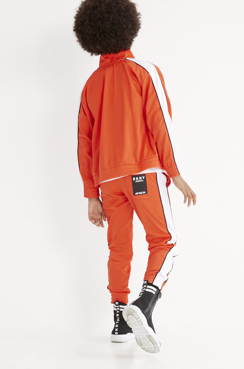 DKNY Детски панталони в оранжево с десен - Pepit.bg