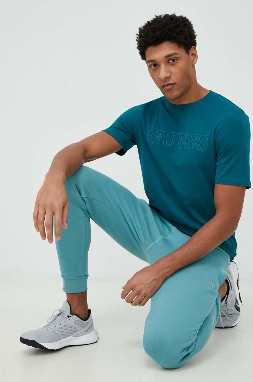 Guess Спортен панталон в бяло с изчистен дизайн - Pepit.bg