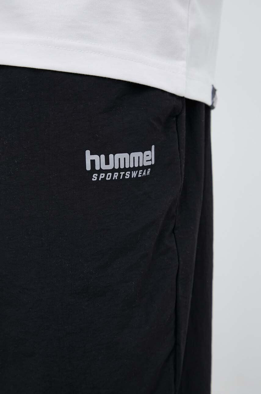 Hummel Спортен панталон в черно с принт - Pepit.bg