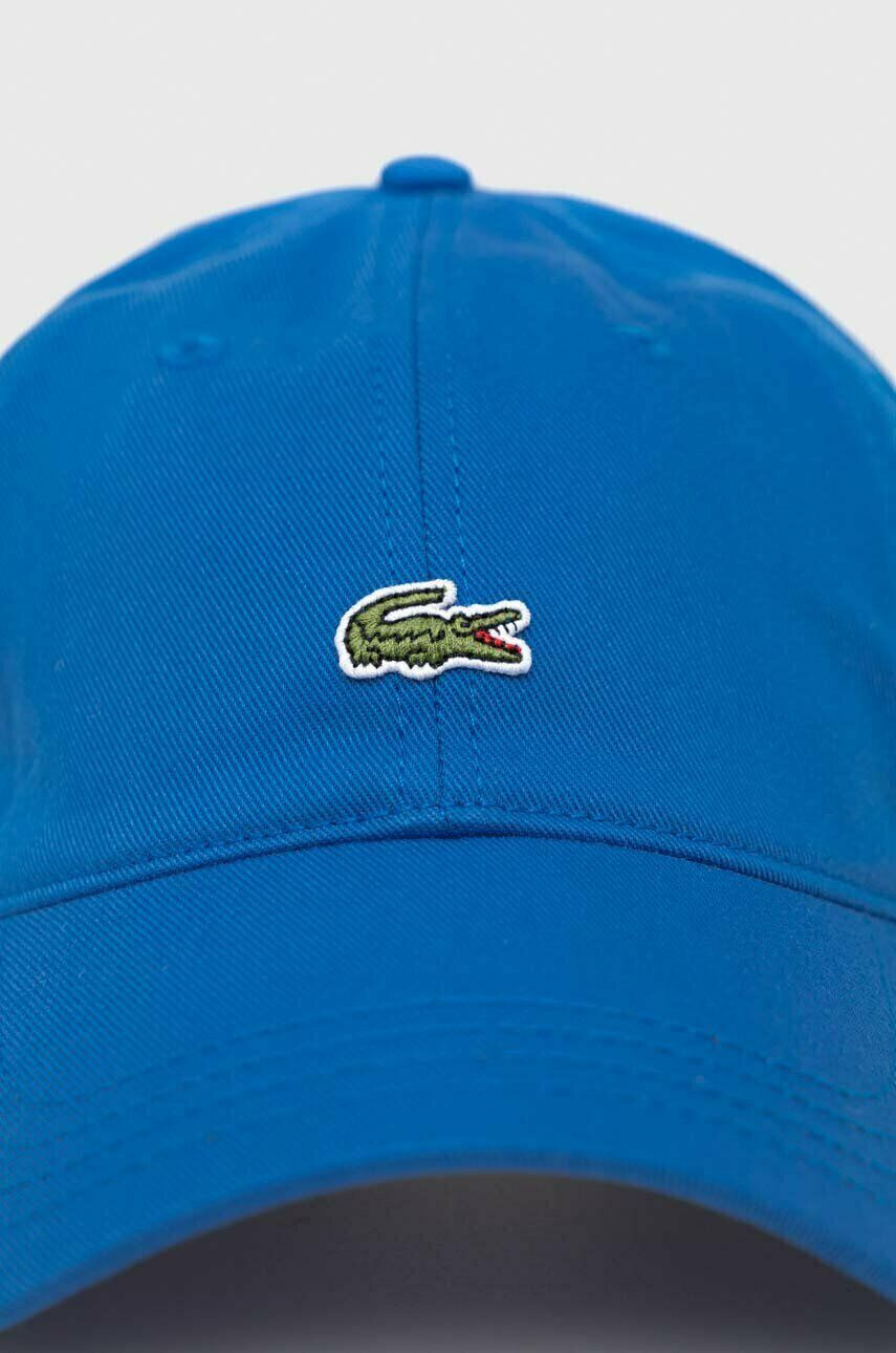 Lacoste Памучна шапка с козирка в тъмносиньо с апликация - Pepit.bg