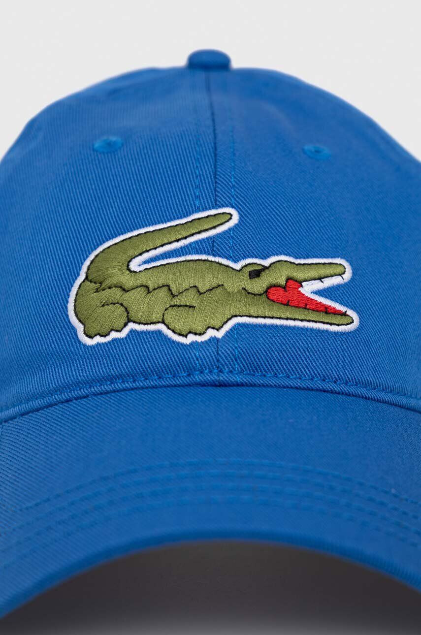 Lacoste Памучна шапка с козирка в тъмносиньо с апликация - Pepit.bg