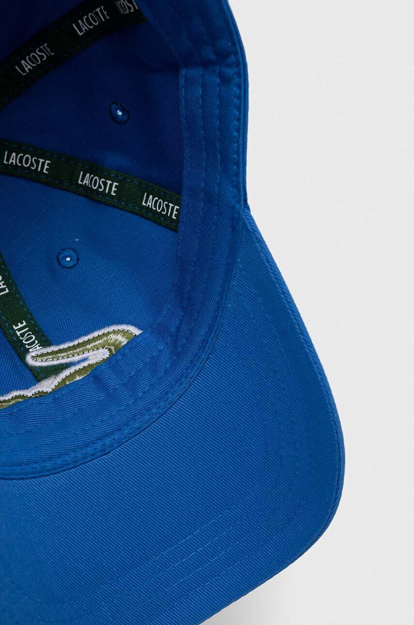 Lacoste Памучна шапка с козирка в тъмносиньо с апликация - Pepit.bg