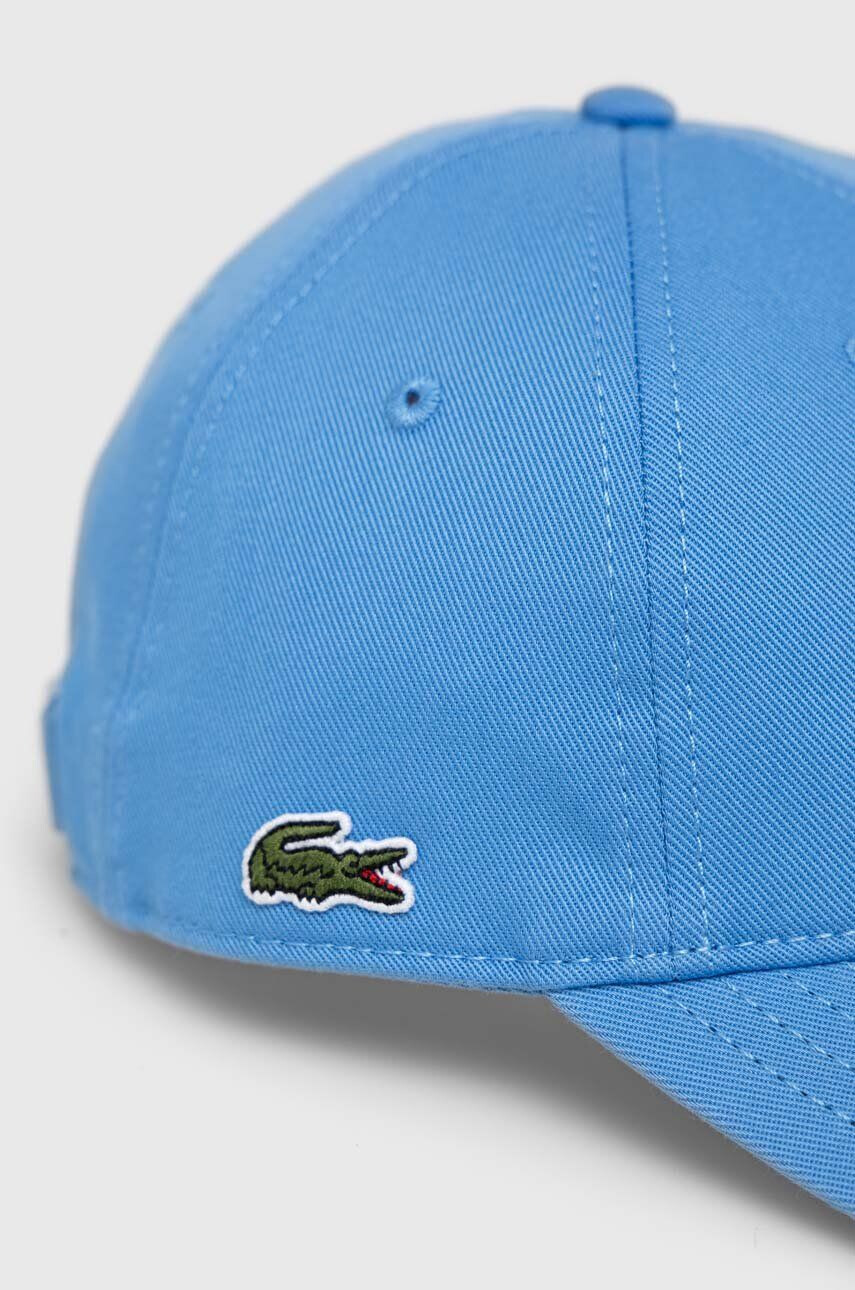 Lacoste Памучна шапка с козирка в синьо с изчистен дизайн - Pepit.bg