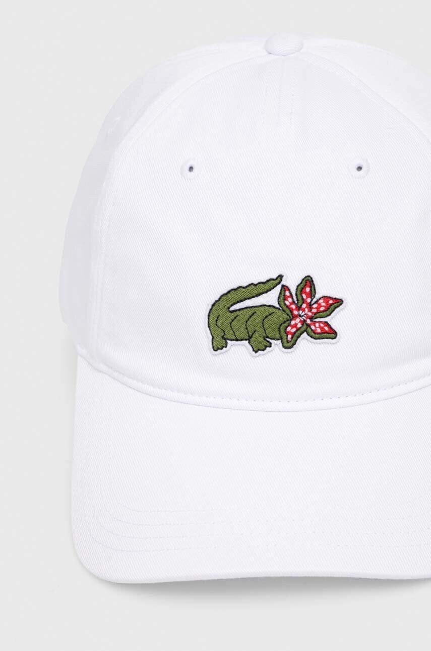 Lacoste Памучна шапка x Netflix в бяло с апликация - Pepit.bg