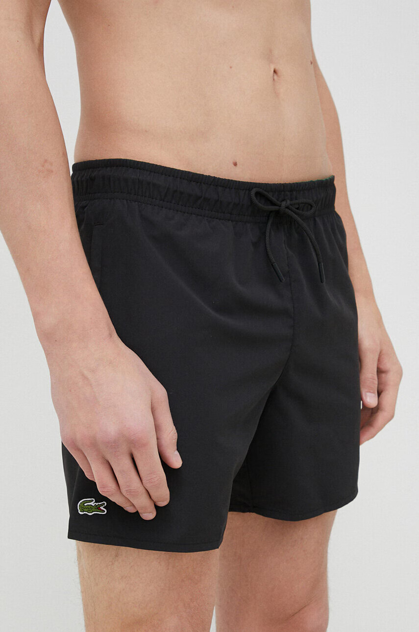 Lacoste Плувни шорти в тъмносиньо - Pepit.bg