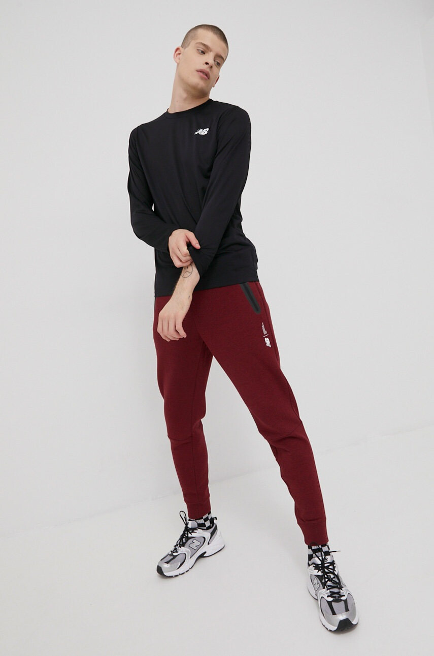 New Balance Спортен панталон в зелено меланж на - Pepit.bg