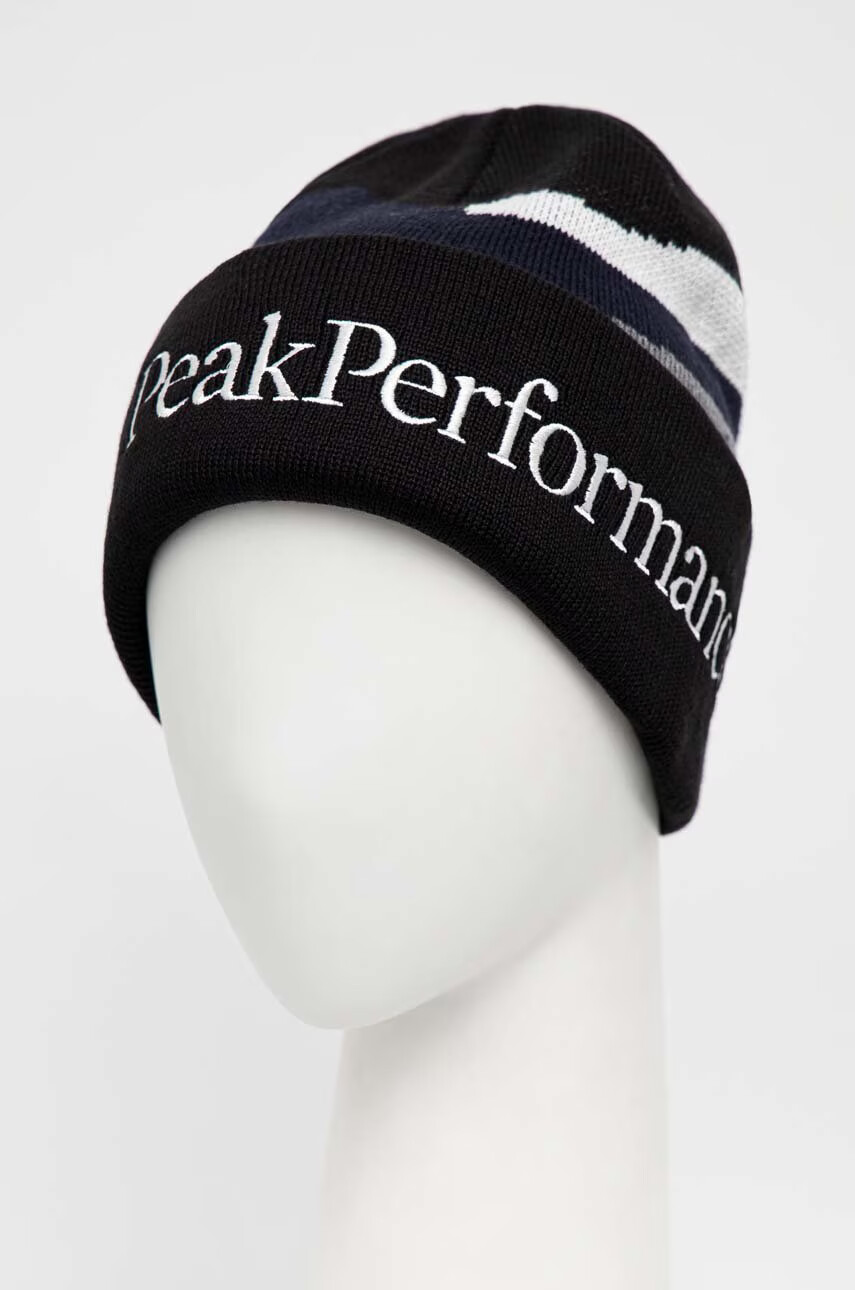 Peak Performance Вълнена шапка в черно от плътен трикотаж от вълна - Pepit.bg