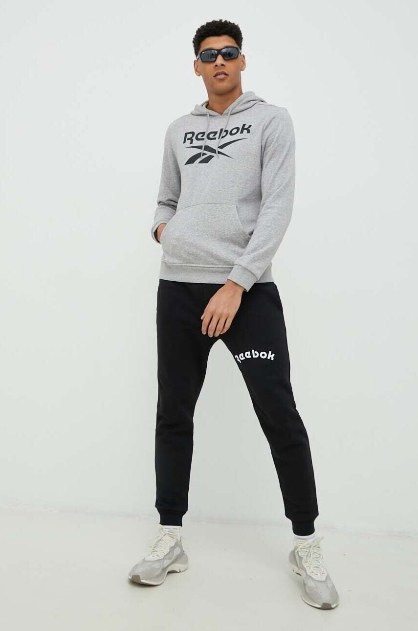 Reebok Спортен панталон в черно с принт - Pepit.bg