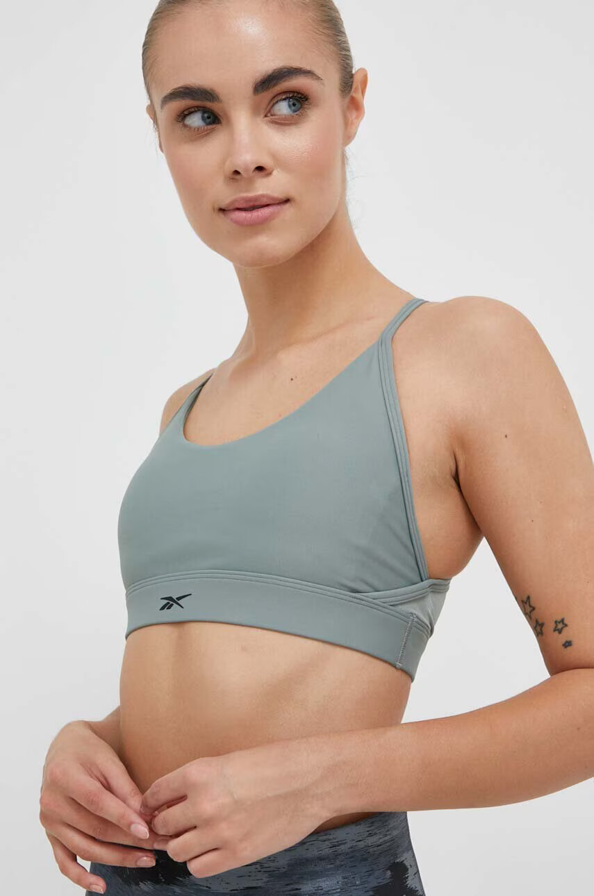 Reebok Спортен сутиен Lux в зелено с изчистен дизайн - Pepit.bg