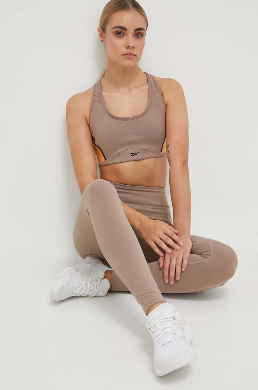 Reebok Спортен сутиен Lux в кафяво с десен - Pepit.bg