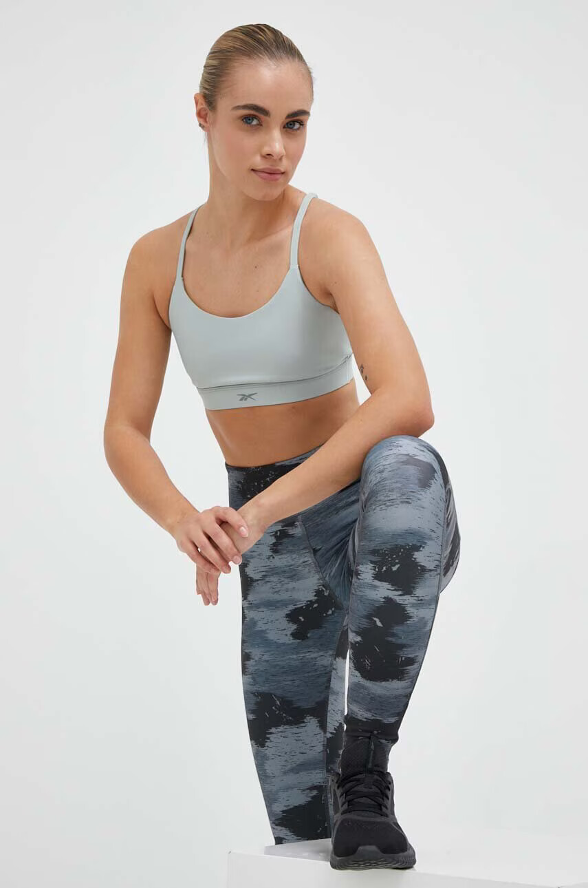 Reebok Сутиен за йога в зелено с изчистен дизайн - Pepit.bg