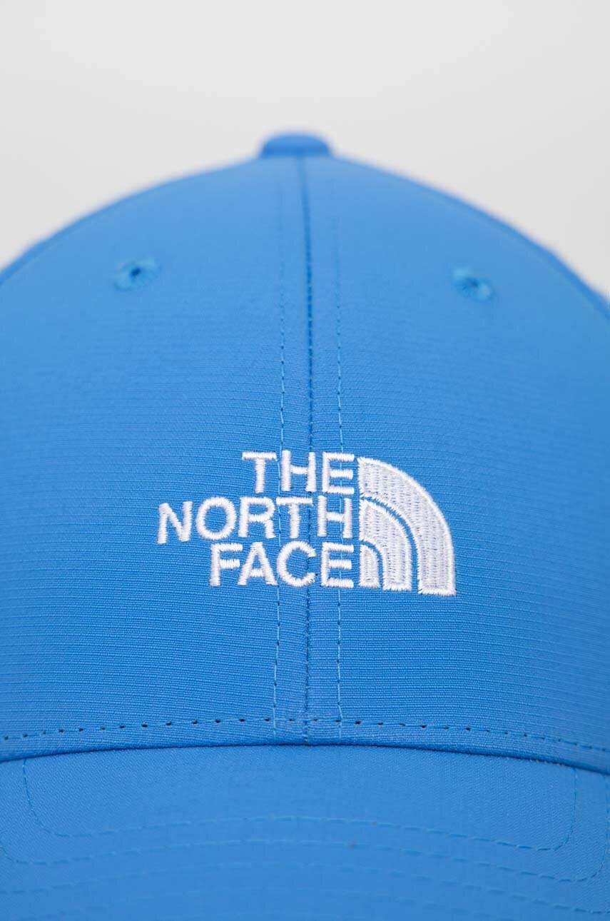 The North Face Детска шапка с козирка в синьо с принт - Pepit.bg