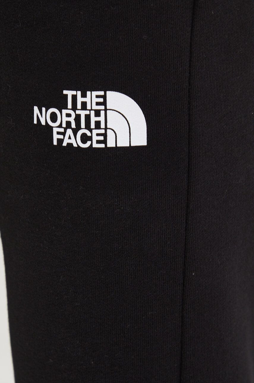 The North Face Памучен спортен панталон в черно с принт - Pepit.bg