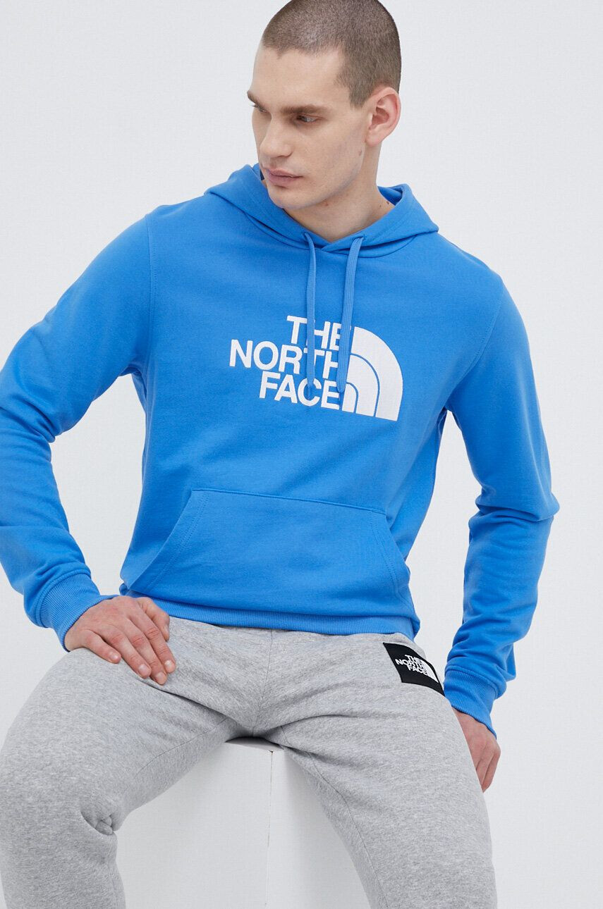 The North Face Памучен суичър в синьо с качулка с апликация - Pepit.bg