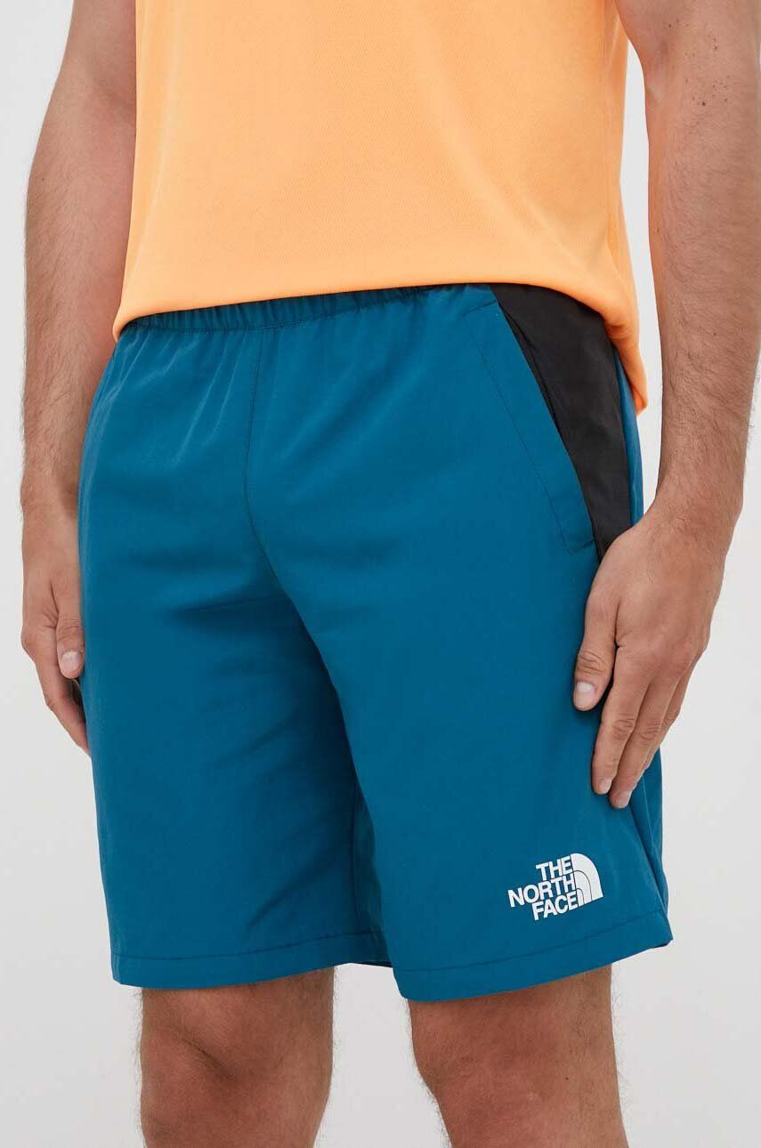 The North Face Спортен къс панталон Mountain Athletics в тюркоазено - Pepit.bg