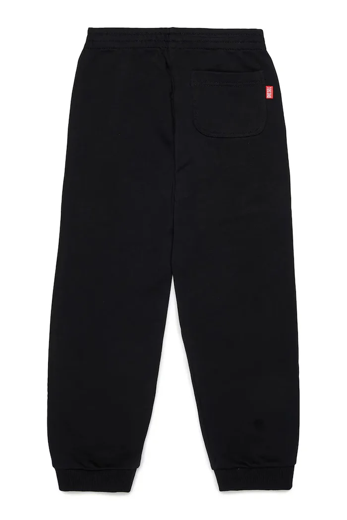 Diesel панталон джогър за деца с памук PRES TROUSERS черен със стандартна талия J03031